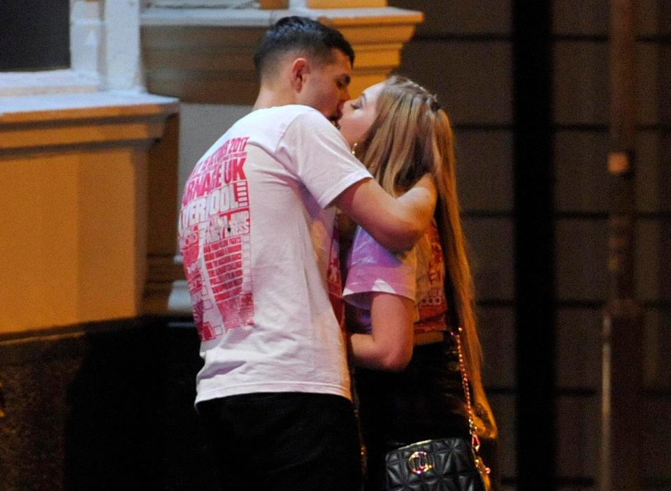  A Carnage couple share a kiss on a night out in Liverpool