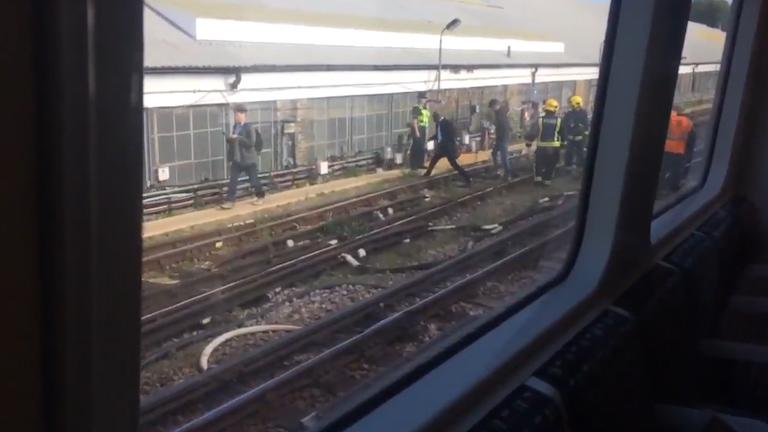 A video from inside Parsons Green Tube Station shows passengers being evacuated