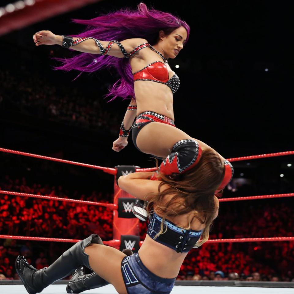  Sasha hits double knees on Emma