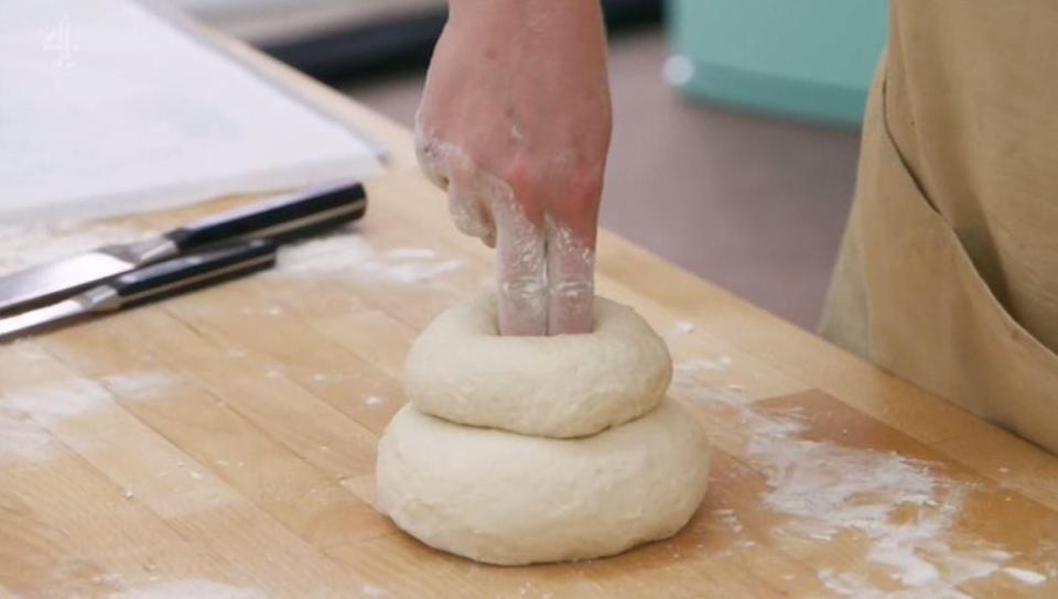  She then showed off the action she uses to make sure her buns stay together