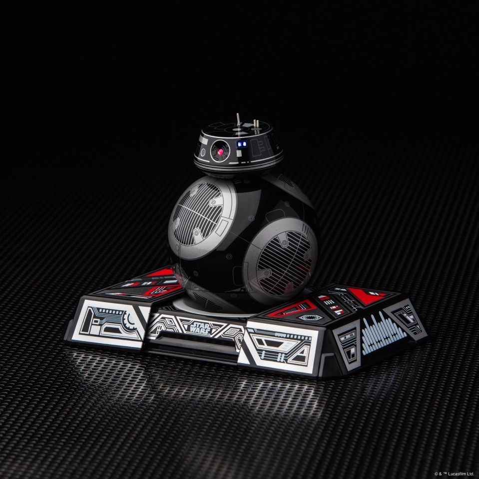 The BB-9E features wireless charging and needs to be placed on a charging plate