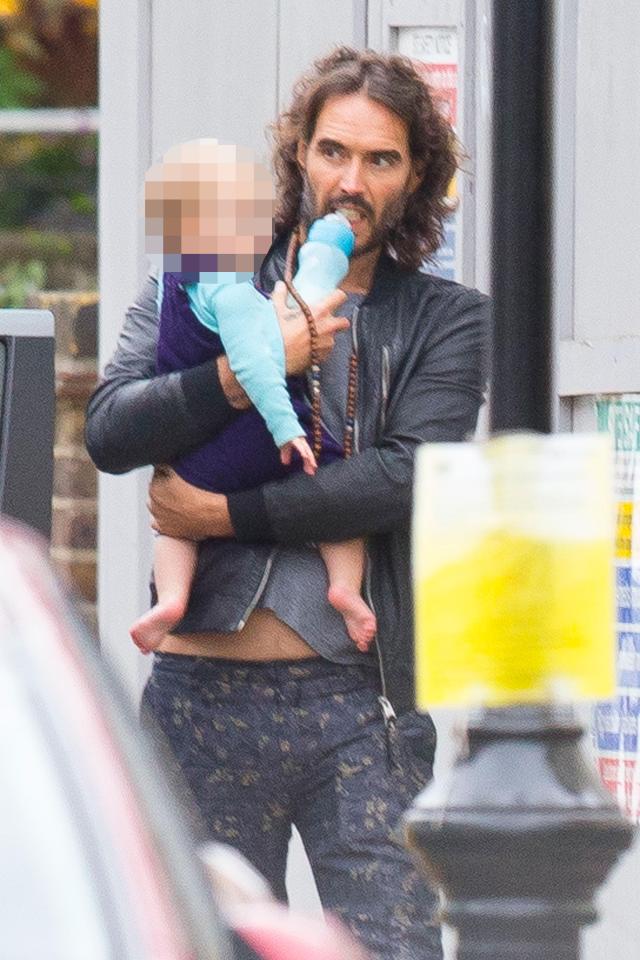  Russell Brand was seen holding his baby daughter Mabel