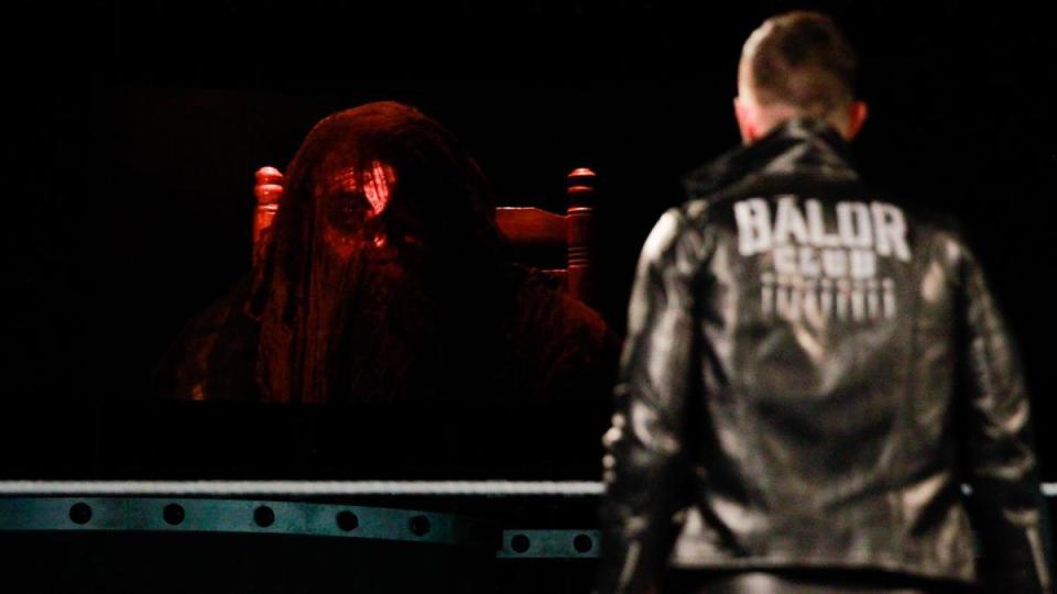  Bray Wyatt as Sister Abigail as Finn Balor looks on