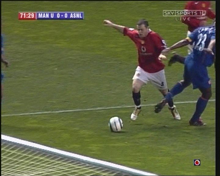  Rooney goes down for a penalty in crunch match