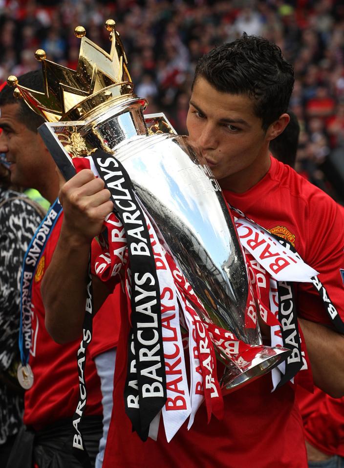  Ronaldo kisses the Premier League trophy in May 2009 after a Red Devils victory