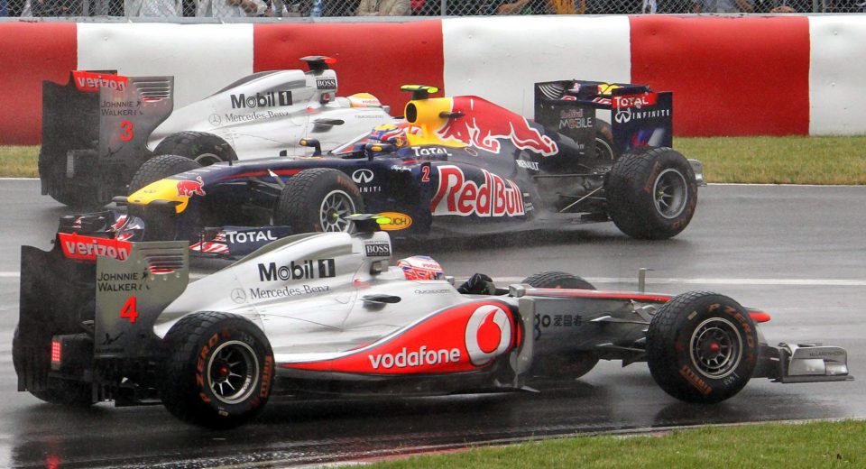  The two McLaren drivers being crudely interrupted by Red Bull's Mark Webber