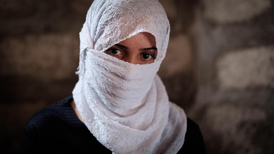  ISIS sells sex slaves to fund its sick cause. Pictured is Khalida, 25, who escaped ISIS