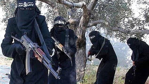  ISIS' all-female Al-Khansa brigade in Syria. It is feared women returning to the UK could launch terror attacks