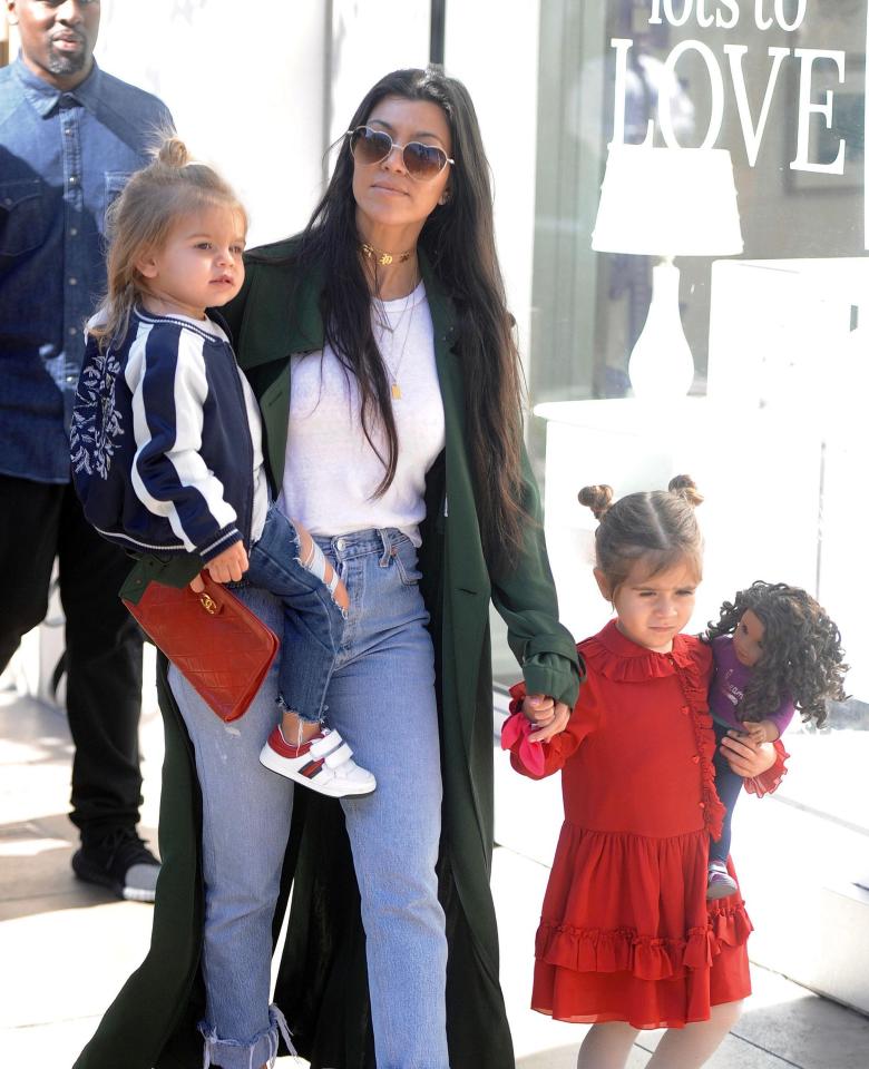  Kourtney with her two youngest children, Reign and Penelope