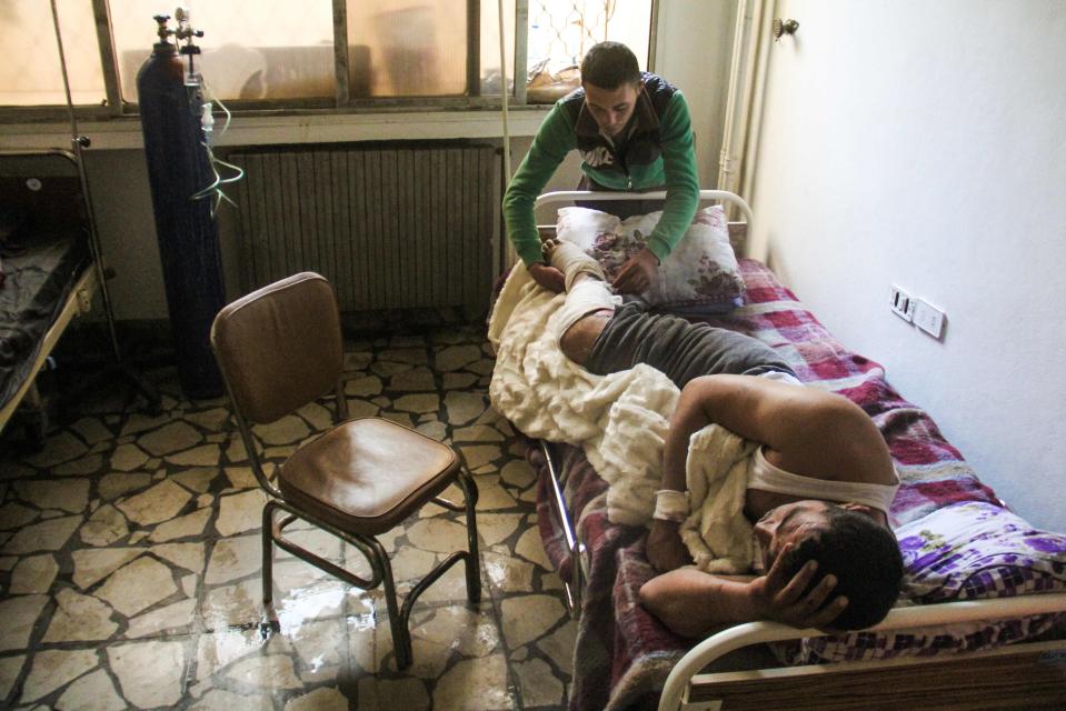  A man lies in a hospital bed after the sarin gas attack in Khan Sheikhun