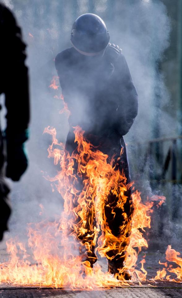  One elite officer is engulfed by flames during the gruelling exercise