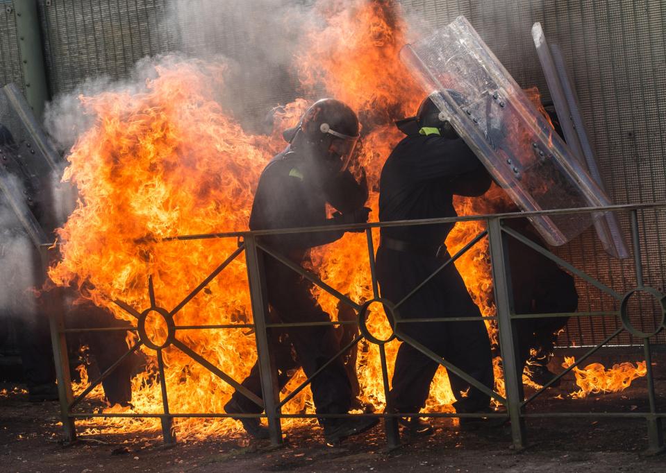  The National Tactical Response Group are pelted with petrol bombs during intense training exercise