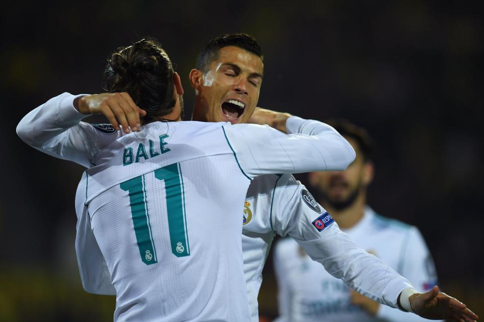  Gareth Bale gets a hug off Cristiano Ronaldo after the Welshman scores for Real Madrid