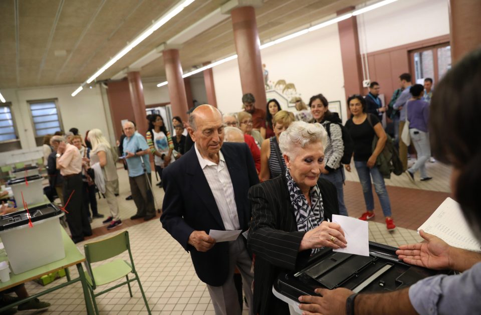  Catalans cast their ballots at the Escola Collaso I Gil school this morning