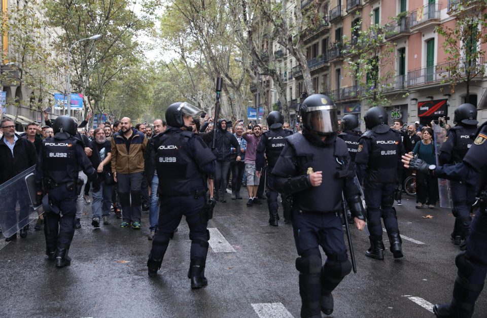  Police were forced to roam the streets of Barcelona during chaos over the independence day vote