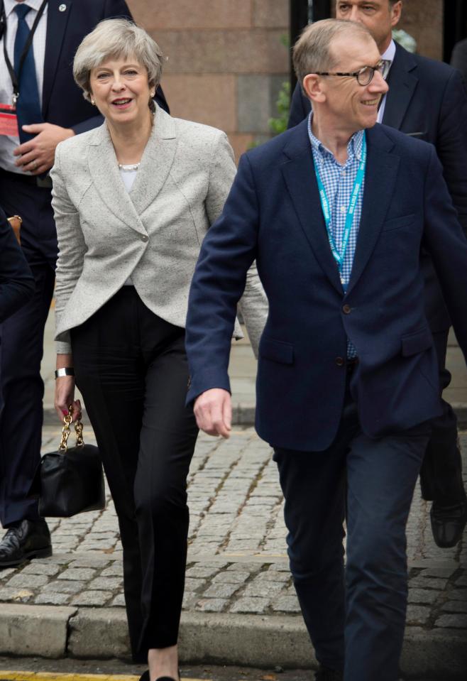  Theresa May and her husband Philip pictured arriving at Tory Party conference