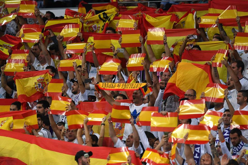  The Real Madrid fans' colours and flags were in stark contrast to those at the Nou Camp earlier