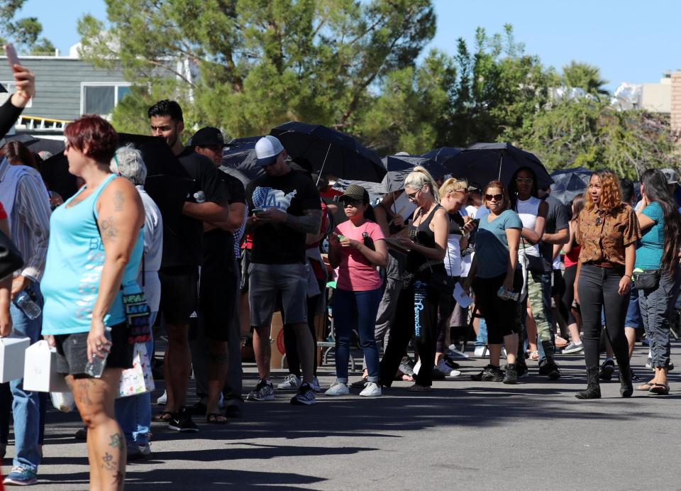  Hundreds of people queue to donate blood following a plea from authorities