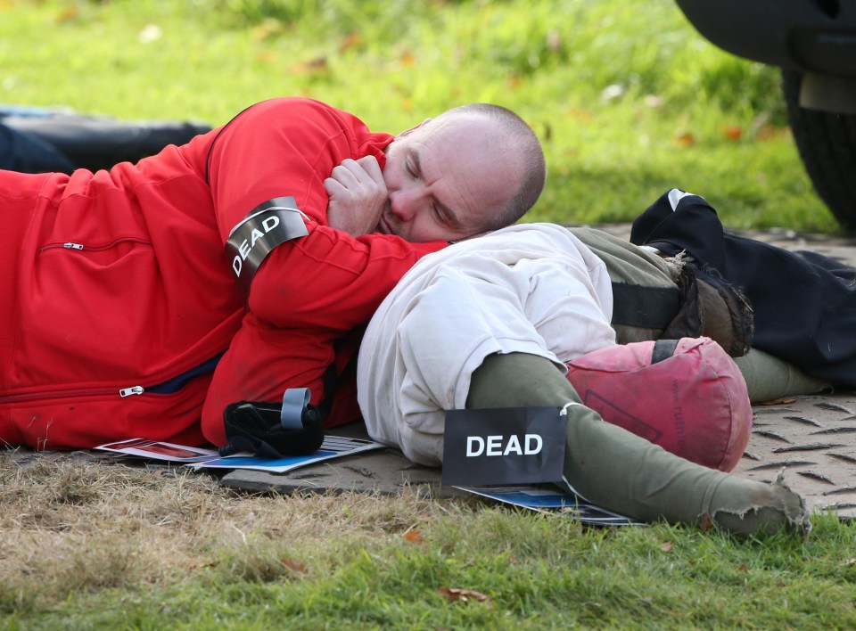 Other volunteers – believed to be police officers – played the role of people killed in the attack