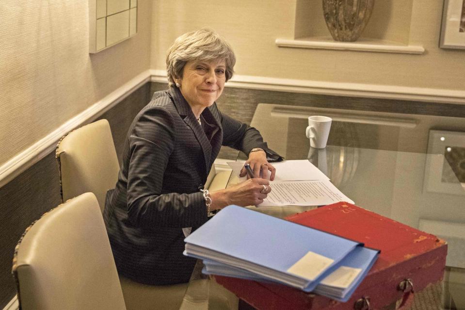  Theresa May all smiles as she prepared her conference speech