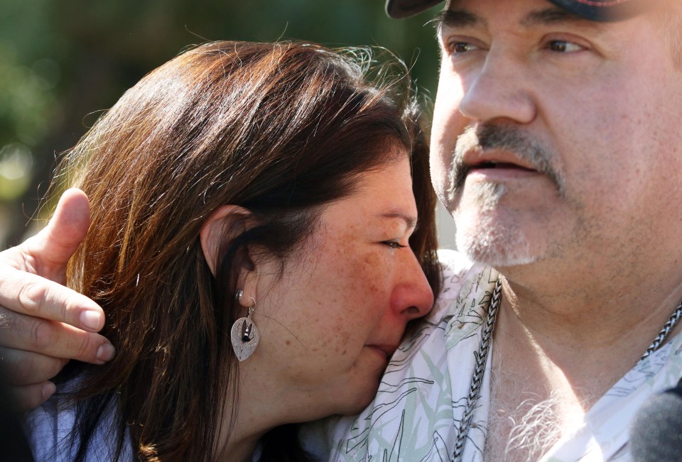 Sanchez comforts his girlfriend Johanna Ernst, who also survived the attack