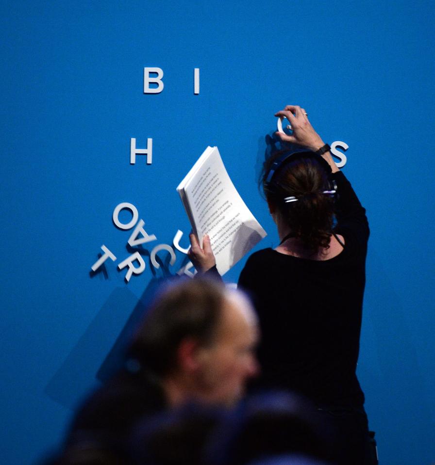  Party workers were later seen taking down the remaining letters from the backdrop