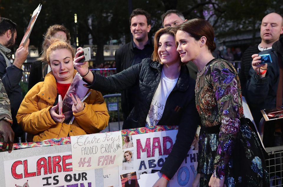  Getting down with her fans . . . Claire poses for selfies with the public