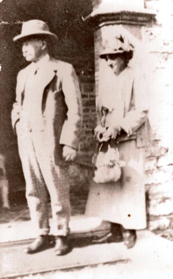  Hardy and wife Florence on the front porch of the luxury pile