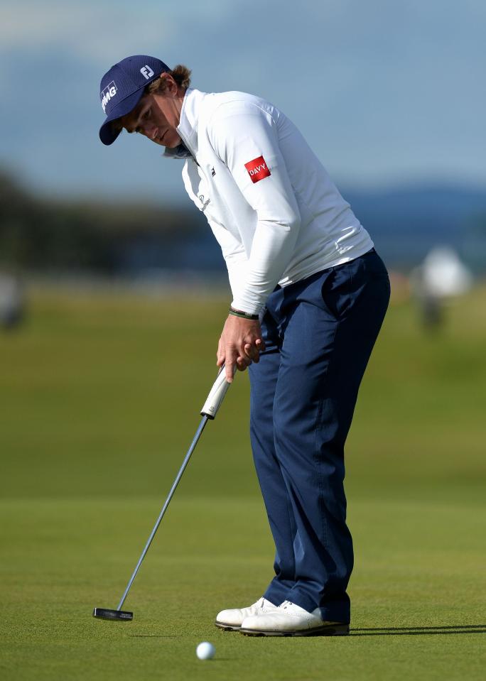  Paul Dunne putts on the seventeenth green