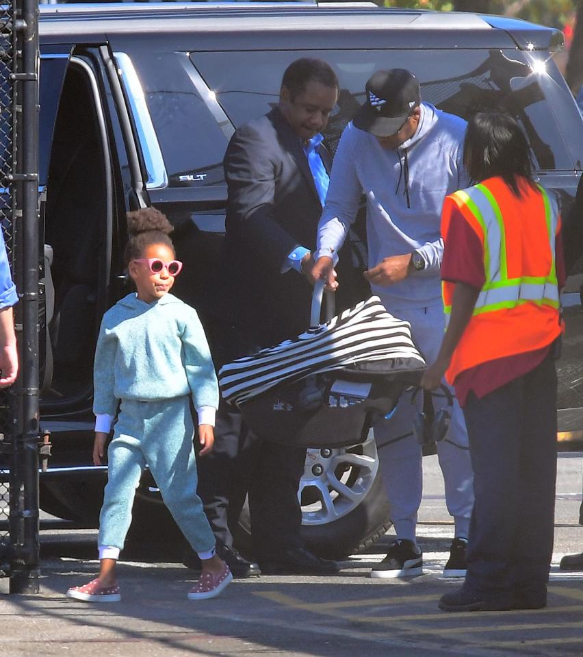  Blue Ivy, 5, followed closely behind her dad and one of the twins