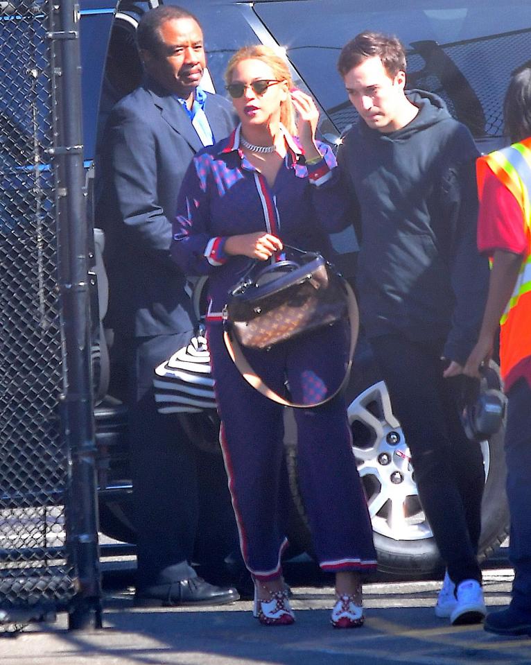  The family were arriving at a helipad with their twins in tow