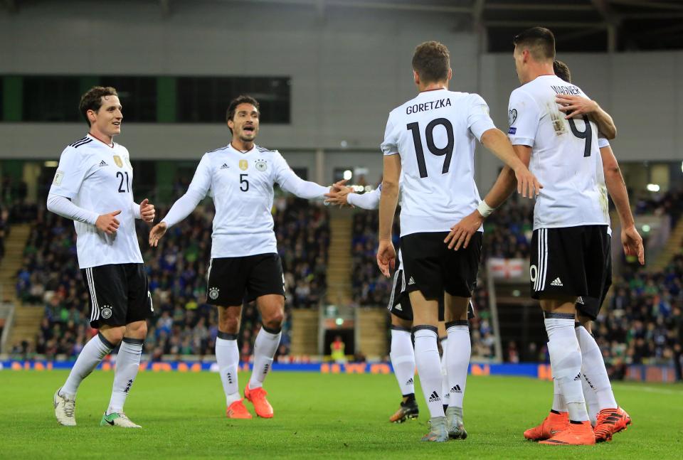  Germany celebrate after Sandro Wagner's strike