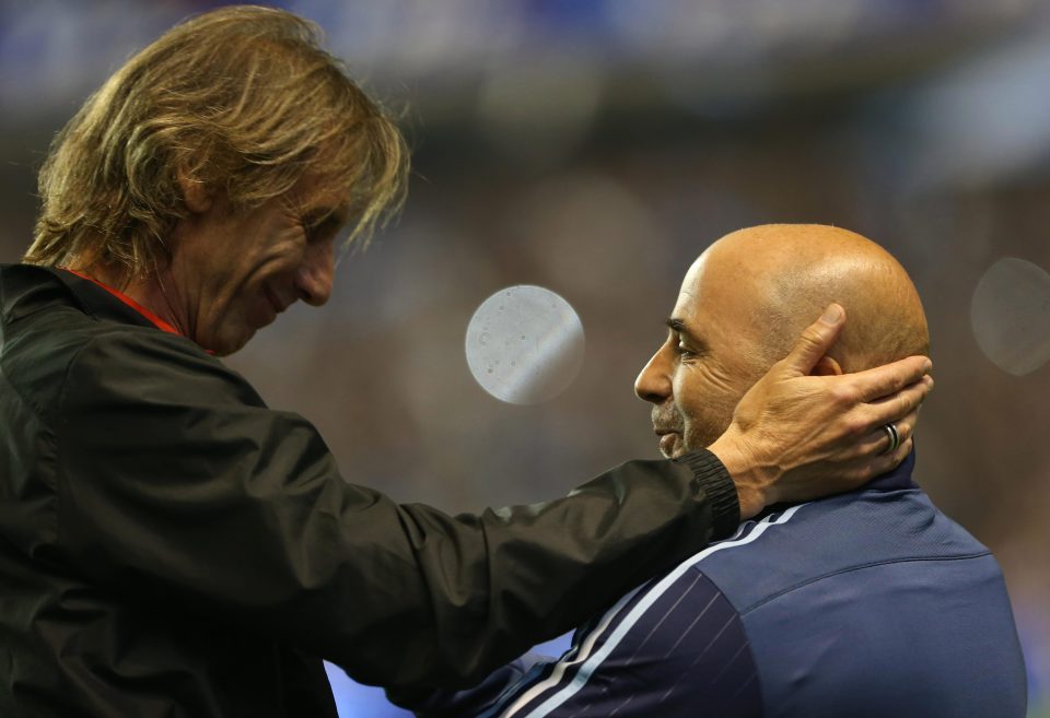  Peru's Argentinian coach Ricardo Gareca meets his opposite number Sampaoli