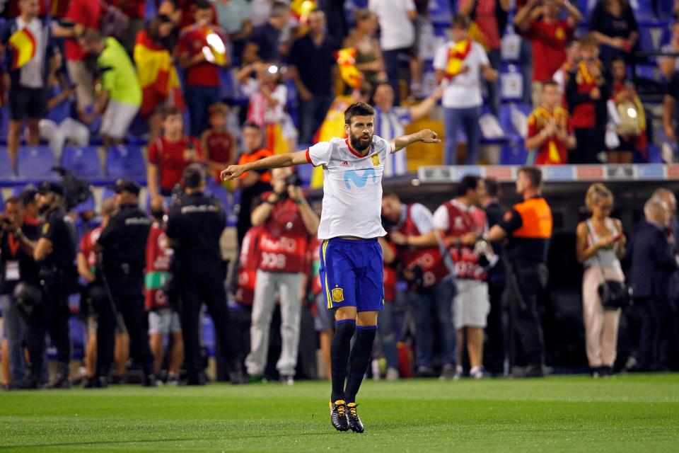  Pique warms up before kick-off at Hercules' home stadium