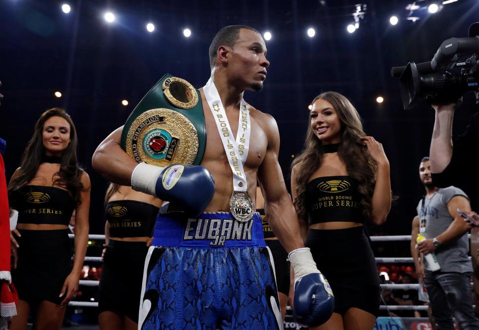  Chris Eubank Jnr celebrates a win last year with ring girls in the background