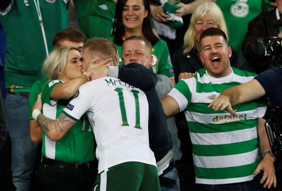  James McClean rushes into the Ireland crowd to kiss wife Erin after scoring the crucial goal against Wales