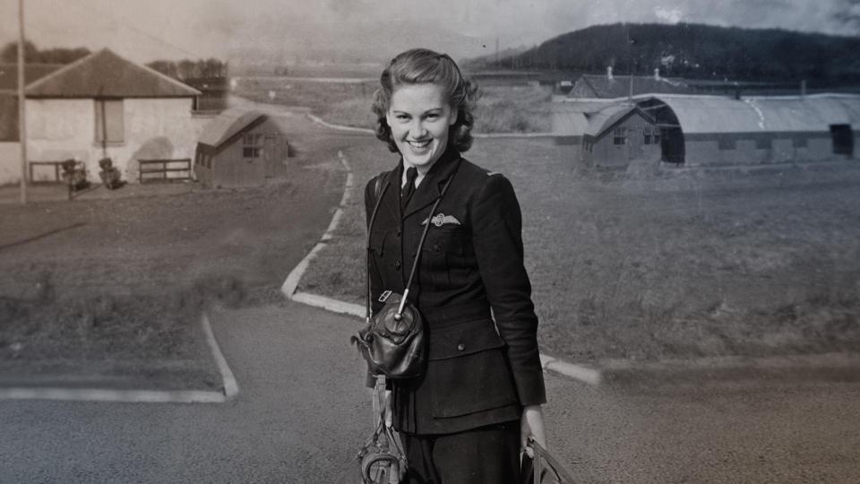  Pilot Joy Lofthouse waits in her uniform to pick up a Spitfire