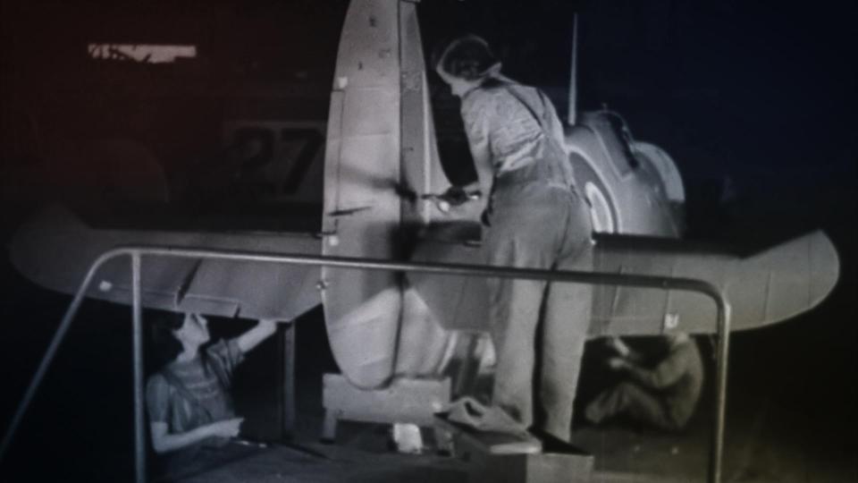  A young woman puts the finishing touches to a Spitfire in one of Salisbury's secret factories