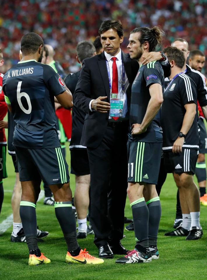  But Gareth Bale, pictured here with Chris Coleman at an earlier qualification game, has urged the boss to stay