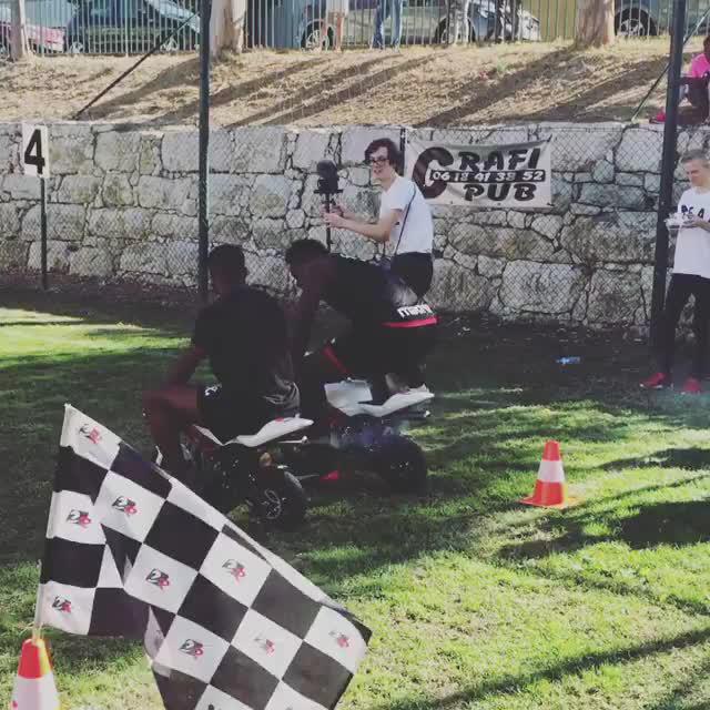  Mario Balotelli set off on a mini-motorbike race with a pal at Nice training