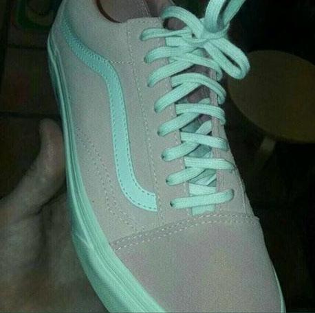  What colour shoe do you see in this photo?