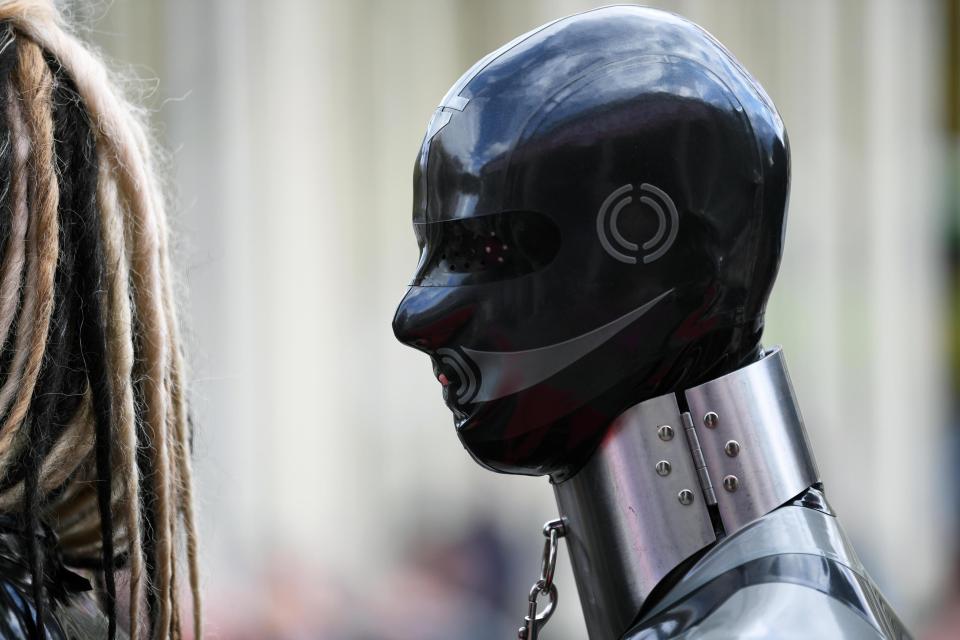  A bizarre robot head is pictured outside the entrance to the fair