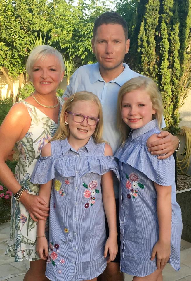  Carl with his wife Melanie and their two daughters, Darcey, 10, and Lois, 12,