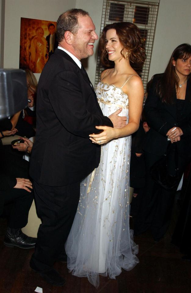  Weinstein pictured with his hand on Kate Beckinsale's waist as they attend the aftershow party of the Avatar premiere in London in December 2004