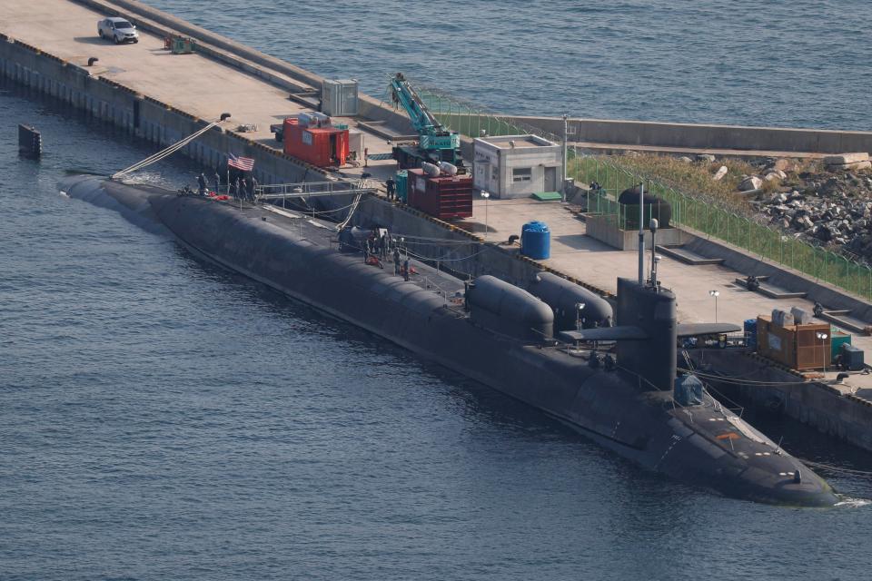  The USS Michigan (SSGN 727), a nuclear-powered guided missile submarine in the US Navy, is docked at naval base in Busan in South Korea in October