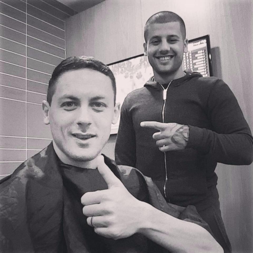  Nemanja Matic looks happy with his hair cut