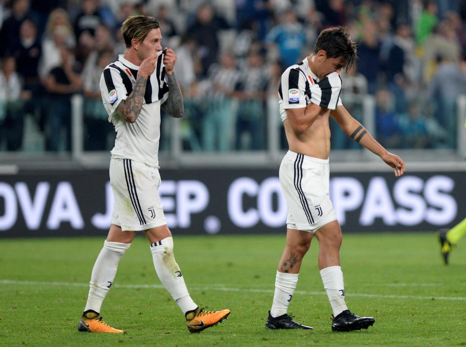  Paulo Dybala and Federico Bernardeschi look dejected after the final whistle