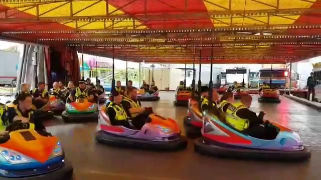  Cop cars: police ride the dodgems while on duty