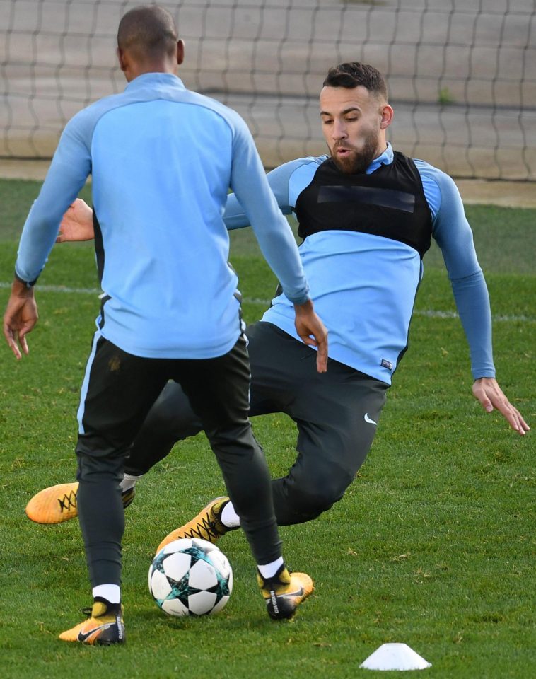  Otamendi slides in to make a tackle