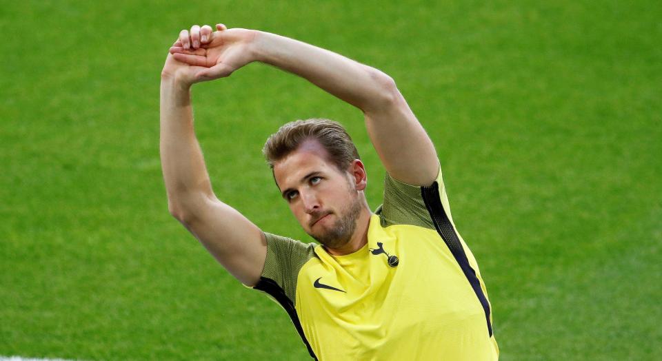  Kane has been going through his stretching routine at the Bernabeu ahead of the Champions League clash with Real Madrid